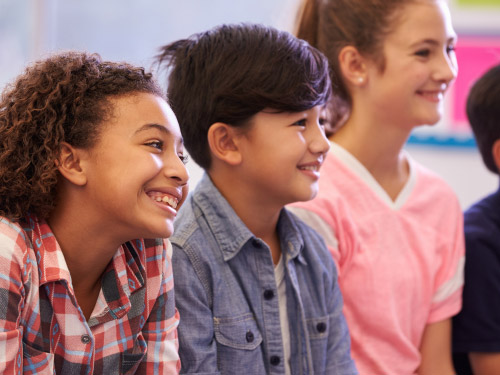 Smiling children in class