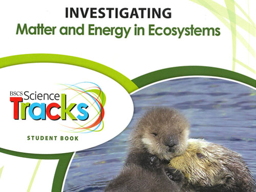 Cover of textbook with sea otters in the water.