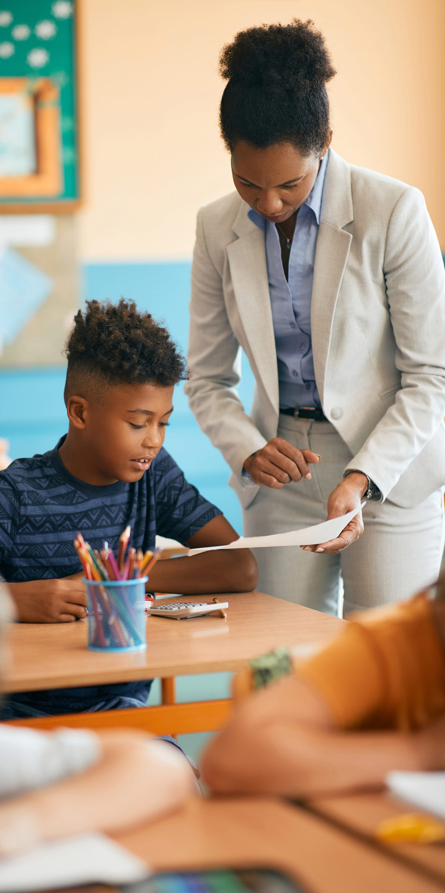 Student and teacher in the classroom